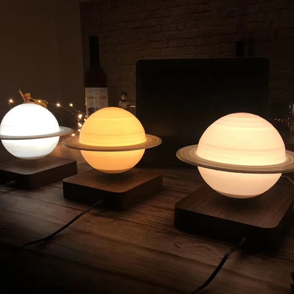 Lampada da tavolo Saturno a levitazione magnetica gravitazionale 3D con base in legno - Foto 1